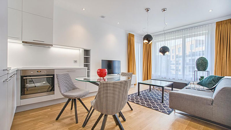 two chairs with glass table on living room